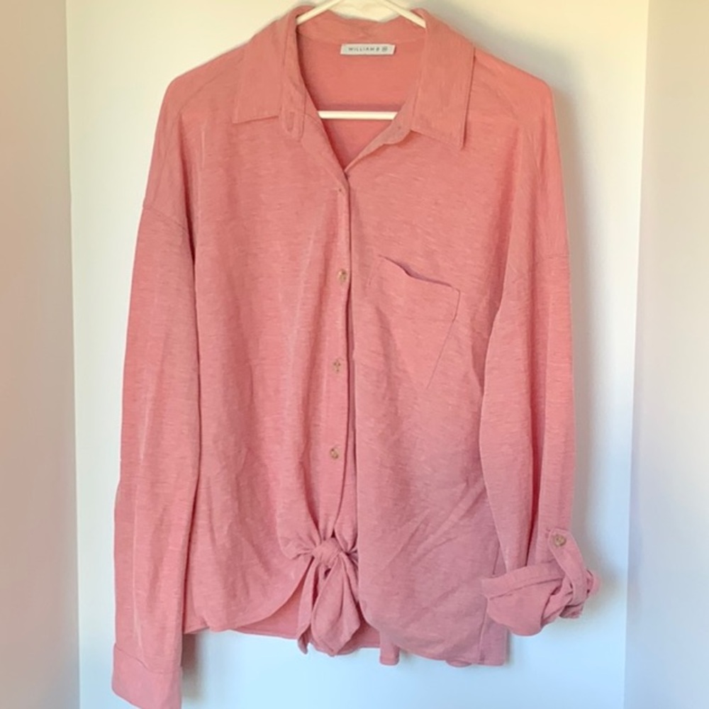 Long sleeve collared shirt with tie front and roll sleeve